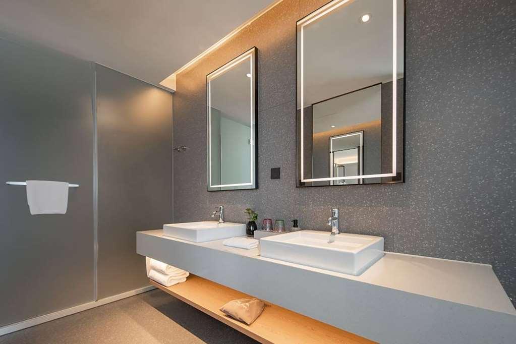Ramada Encore By Wyndham Shanghai Pudong Airport Стая снимка