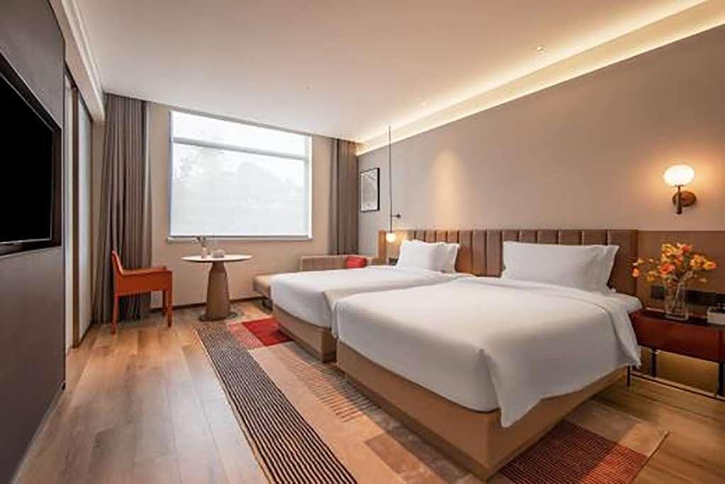 Ramada Encore By Wyndham Shanghai Pudong Airport Стая снимка